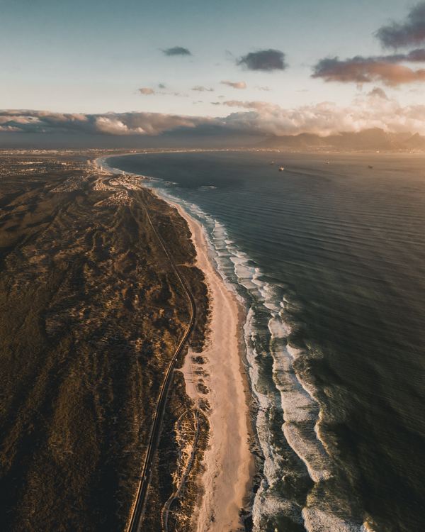 ZACPT Cape Town brown sand near body of water during daytime Dibert Theron.jpg